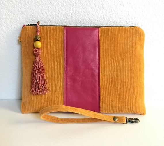 pink and orange clutch bag