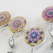 see more listings in the Pretty Glass Badge Reels section