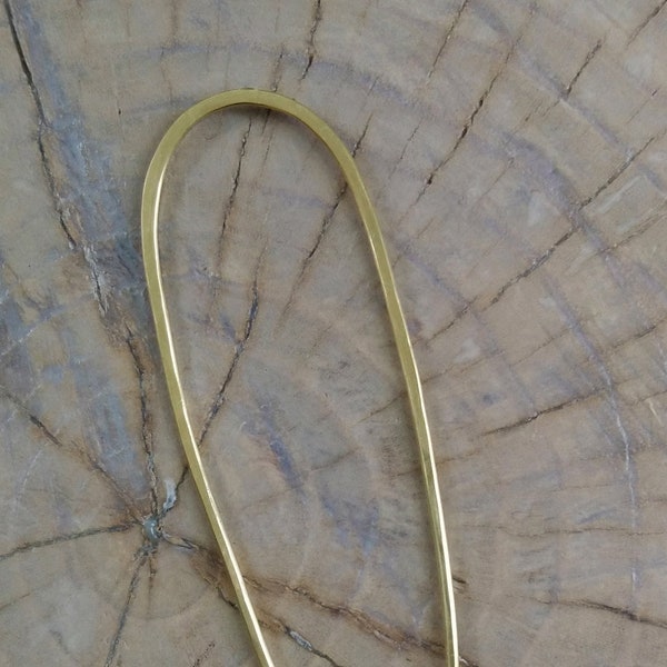 Hair Pin "Pinned" heavy gauge brass wire shaped and hammered by hand.