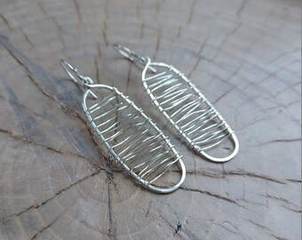 Earrings... "Rapids" sterling silver wire wrapped and hammered earrings.