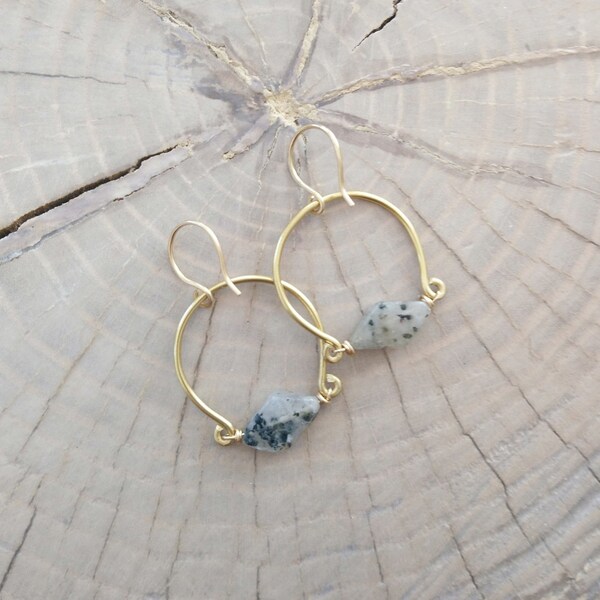 Earrings... "Stellar" earrings are a beautiful black spotted quartz gemstone caught in brass wire.