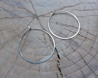 Earrings... "Running in Circles" earrings are beautiful light sterling silver hoops.