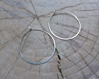Earrings... &quot;Running in Circles&quot; earrings are beautiful light sterling silver hoops.