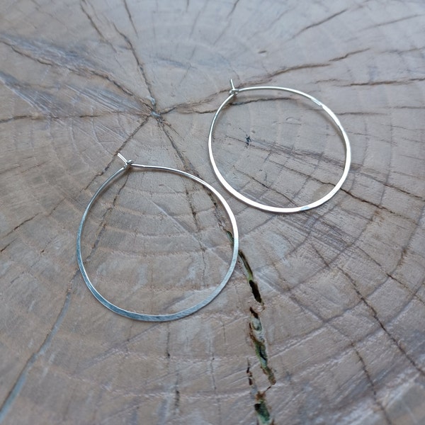 Earrings... "Running in Circles" earrings are beautiful light sterling silver hoops.