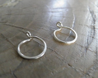 Earrings... "Tiny hoops" hand wrapped and hammered fine sterling silver filled earrings.