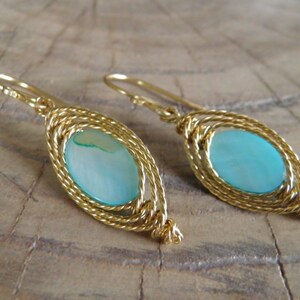 Earrings... &quot;Ocean Sunset&quot; beautiful Shell hand wire wrapped in brass.