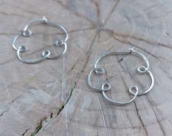 Earrings... "In the Clouds" Sterling silver handmade and hammered hoops