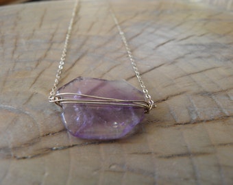 Sterling Silver Necklace... "Amethyst" beautiful amethyst stone wrapped in silver and hanging on sterling silver chain.