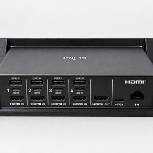 May include: A black GL.iNet HDMI KVM switch mounted in a rack bracket. The front panel features four USB 2.0 ports, four HDMI IN ports labelled 1 through 4, one HDMI OUT port, a 5V3A power input, and an Ethernet port with double arrow icons.