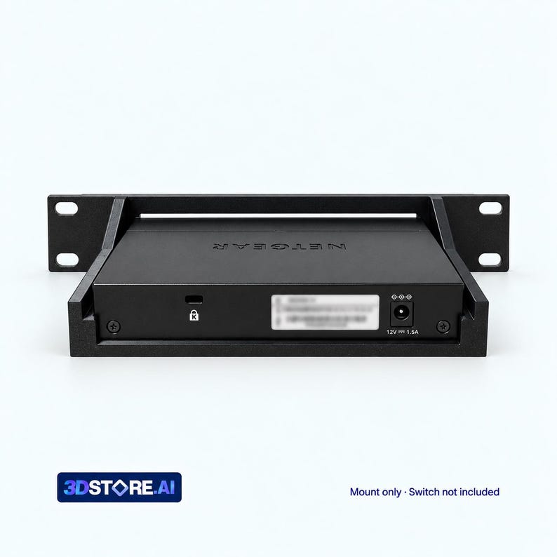 May include: A black metal rack mount bracket holding a Netgear network switch. The device features a power input port labelled 12V 1.5A, a security lock slot, and a label with serial information. The bracket has side flanges with mounting holes.