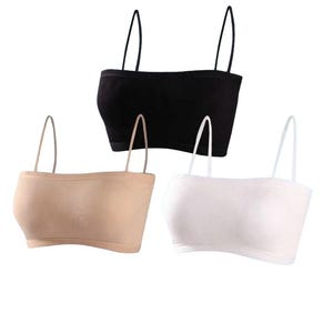 May include: A set of three strapless crop tops with thin spaghetti straps, featuring a ribbed texture. The tops are presented in solid black, beige, and white colors, each designed with a straight neckline and a fitted, seamless construction.