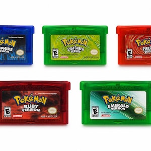 May include: Five Game Boy Advance video game cartridges including Pok&eacute;mon Sapphire, LeafGreen, FireRed, Ruby, and Emerald versions. Each rectangular plastic cartridge features a unique color and a label with the game title and ESRB rating.