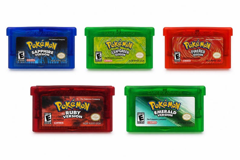 May include: Five Game Boy Advance video game cartridges including Pok&eacute;mon Sapphire, LeafGreen, FireRed, Ruby, and Emerald versions. Each rectangular plastic cartridge features a unique color and a label with the game title and ESRB rating.