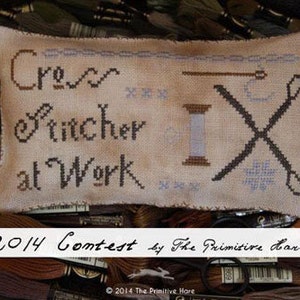 Cross Stitcher at Work