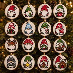 May include: A set of sixteen circular cross-stitch ornaments featuring various gnome designs, including gnomes with red and green hats, holding items like presents, candy canes, stars, lanterns, and gingerbread men, all framed in small wooden embroidery hoops.