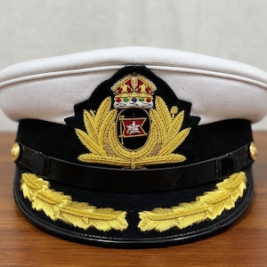 Formal White and Black Officer Cap with Gold Embroidered Insignia and Laurel Trim