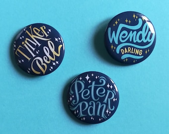 Peter Pan pins, set of three: Peter Pan, Wendy Darling and Tinker Bell, buttons inspired by the novel by J.M. Barrie