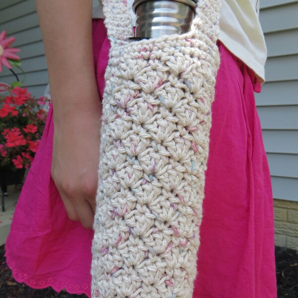 Tall water bottle holder in cream crochet shells with adjustable length straps, long length for crossbody wear