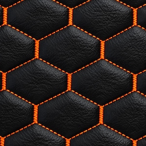May include: A black leather material featuring a repeating hexagonal pattern stitched with vibrant orange thread. The surface has a textured grain, and the geometric seams create a quilted appearance across the entire visible area.
