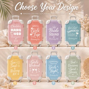 May include: Eight miniature suitcases in various pastel colors, each featuring unique white text and graphic designs. The text includes phrases like Charlotte's Hangover, Girls Trip, Bride Squad, Let's Get Shipfaced, Sun Sand & Recovery Kit, Girls Weekend, Surviving Another Girls Night, and Bad Decisions Good Stories.