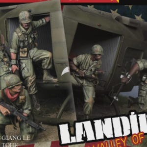 May include: A scale model diorama featuring four miniature soldiers in olive drab uniforms exiting a military helicopter. The figures carry rifles and gear. The text LANDING VALLEY OF DEATH is printed in white and orange at the bottom right corner.