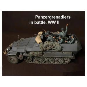 May include: A scale model of a grey armored half-track vehicle carrying four painted soldier figures in combat gear. The vehicle features detailed tracks, wheels, and external storage bags. Text on the image reads: Panzergrenadiers in battle. WW II.