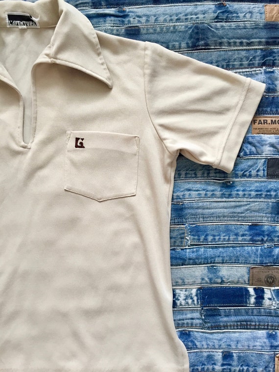 Still With Tags On IT never Worn VINTAGE 1 Polo Style Shirt 1989 by GUESS With Logo on front says GUESSvU.S.A