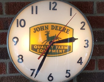 1970s JOHN DEERE Quality Farm Equipment Pam Clock Co. Inc. N.Y.  Still operates and keeps time, lights, and looks great in any collection.