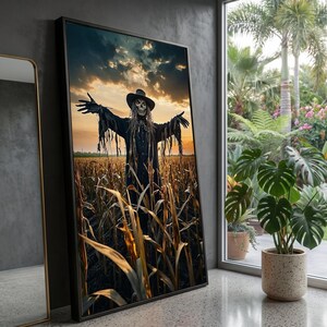 Peut inclure: Une impression d'art mural verticale encadrée représentant un épouvantail au visage de crâne et au chapeau à larges bords dans un champ de maïs au coucher du soleil. L'épouvantail porte un vêtement sombre et en lambeaux, bras étendus.