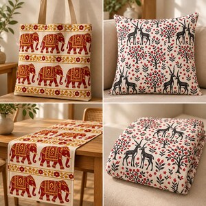 May include: A collection of home textiles featuring two distinct patterns: a tote bag and table runner with a red elephant motif on a cream background, and a throw pillow and folded blanket with a black deer and red floral print on cream.