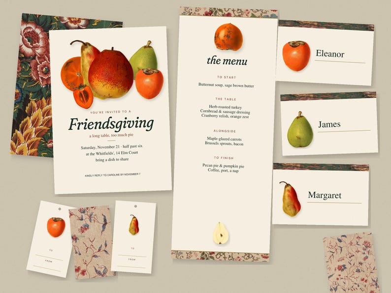 May include: A Friendsgiving stationery set featuring a cream-colored invitation, a tall menu card, three place cards with names Eleanor, James, and Margaret, and two gift tags, all decorated with illustrations of pears and persimmons.