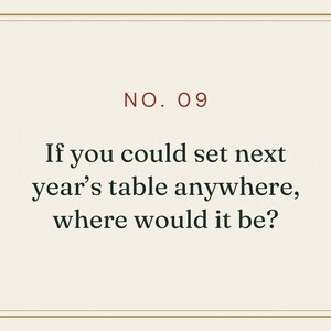May include: A rectangular card with a cream background and a thin gold border. The text NO. 09 appears in dark red at the top, followed by the black text: If you could set next year's table anywhere, where would it be?