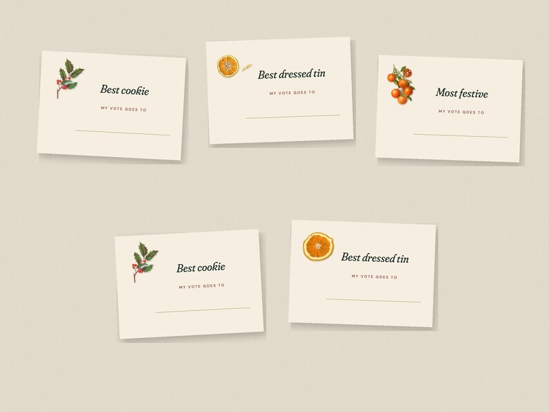 May include: Five off-white rectangular voting cards with black text and botanical illustrations. Two cards read Best cookie with holly, two read Best dressed tin with orange slices, and one reads Most festive with small oranges.
