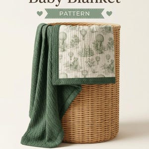 May include: A baby blanket pattern featuring text that reads Baby Blanket Pattern, Beginner Friendly, Full Video Tutorial, and A4 + A0 + US Letter. The blanket has a solid dark green textured side and a cream side with a green hot air balloon print.
