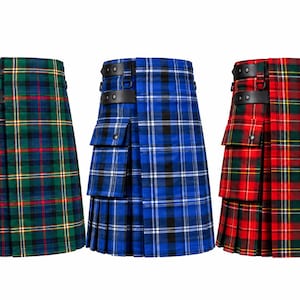 Może przedstawiać: Trzy kilty użytkowe o plisowanym kroju, z bocznymi kieszeniami cargo zapinanymi na zatrzaski oraz czarnymi paskami z imitacji skóry z metalowymi klamrami w talii. Kilty posiadają wzory w kratę w kolorach zielonym, niebieskim i czerwonym.