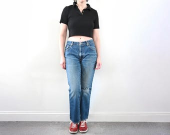 Vintage Y2K Express blauwe bootcut jeans met lage taille, maat 11/12 S