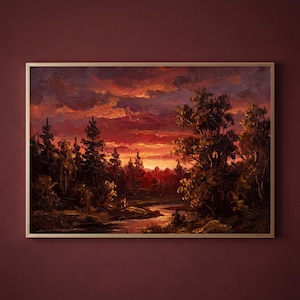 May include: An oil painting in a thin gold frame depicting a landscape at sunset. The scene features a winding river flowing through a dense forest of dark trees under a dramatic sky filled with vibrant shades of orange, red, and deep purple clouds.