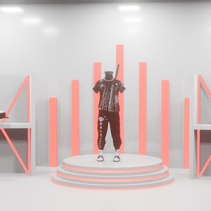 May include: A mannequin wearing a black and white patterned t-shirt and black joggers with white text on the leg, standing on a circular platform. To the left is a black hat on a shelf, and to the right is a black backpack on a matching shelf.