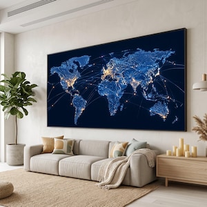 May include: A large rectangular wall art piece featuring a dark blue world map at night. The continents are illuminated by glowing blue and gold light clusters, with thin lines connecting various global locations across the dark background.