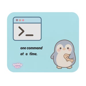 May include: A light blue rectangular mousepad featuring a terminal window icon with a command prompt, the text "one command at a time.", a small penguin holding a fish, and the "Bashful Byte" logo in the bottom left corner of the design.