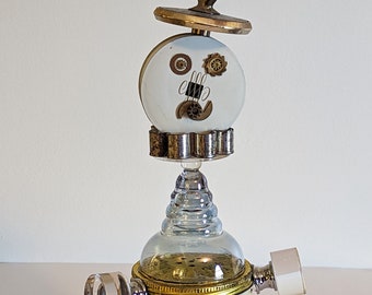 Henri - Mixed Media Sculpture, Re-Purposed Man About Town of TV Dial, Typewriter, Talc, Baking Tins, Glass Dessert Dish, Drawer Pulls