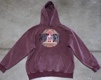 Sudadera extragrande con capucha y estampado de Buda Drye pintado con efecto nieve.