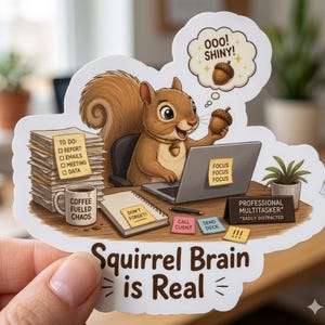 May include: A die-cut sticker featuring a brown squirrel at a desk with a laptop, a stack of papers, a coffee mug labeled 'COFFEE FUELED CHAOS', and sticky notes. The text reads 'Squirrel Brain is Real', 'OOO! SHINY!', and 'PROFESSIONAL MULTITASKER*'.