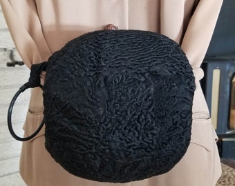 Mof van Perzisch lamsbont uit de jaren 1930 met ritsvak en lushandvat!