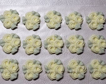 Royal icing flowers for cookie decorating, groups of 3 swirl roses with leaves, pastel yellow