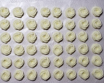 Royal icing flowers for cookie decorating, swirl roses, pastel yellow