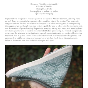 May include: A close-up of a teal blue and white woven tea napkin. The napkin is folded in a triangular shape and held in a hand. The text "Lace weave 2.1 Little Tea Napkins" is visible at the top of the image.