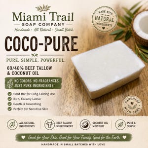 Könnte beinhalten: Ein rechteckiges, cremeweißes Stück Seife mit der Aufschrift Miami Trail Soap Company Coco-Pure. Der Text gibt 60/40 Rindertalg und Kokosöl an. Weitere Texte sind Made with Natural Ingredients, Handmade with Care und Pure. Simple. Powerful.