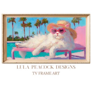 May include: A framed painting depicts a white cat wearing heart-shaped sunglasses and a straw hat, lounging on a pink chaise lounge. The background features a pool, palm trees, and a blue sky. The text "LULA PEACOCK DESIGNS TV FRAME ART" is at the bottom.