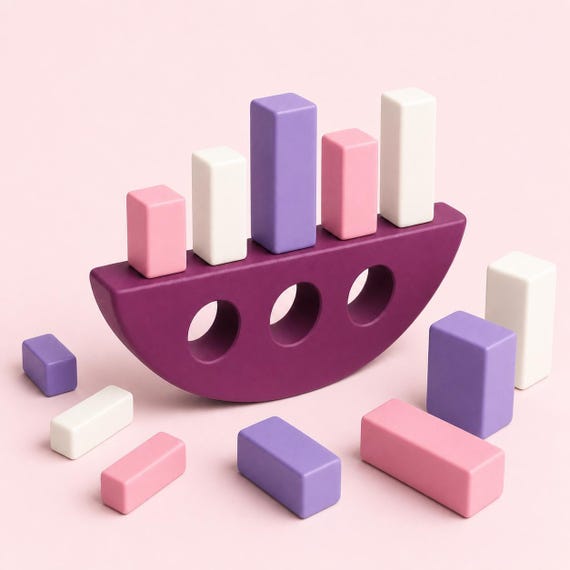 Candy Shift ArcTumble gravity stack game with a plum rocker and twelve pink, lilac, and ivory blocks on a pale blush background